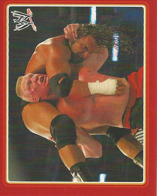 WWE Topps Icons 2013 Sticker Collection Brock Lesnar vs Triple H No.12